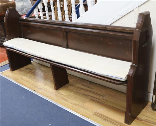 An oak pew W.216cm